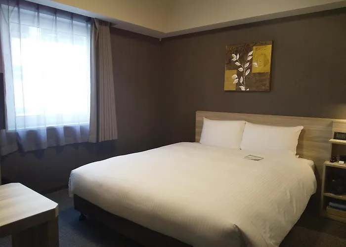 三原站前露樱酒店